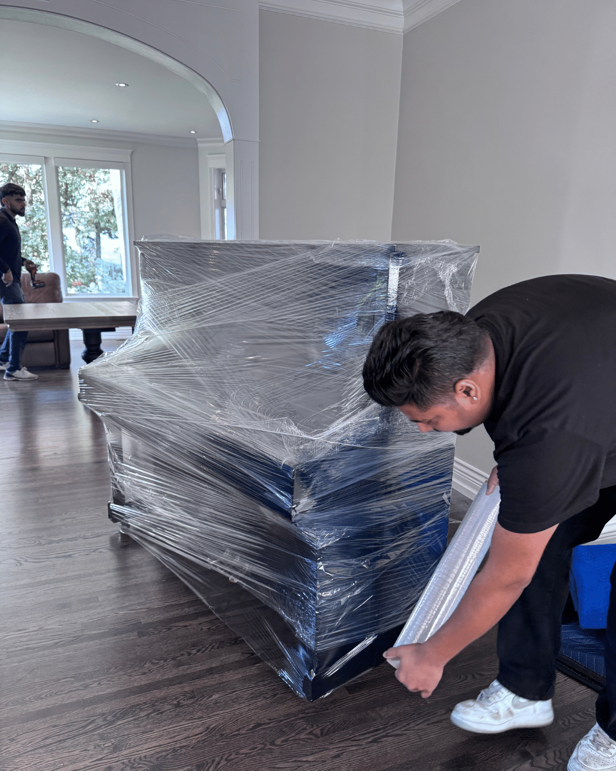 Furniture carefully wrapped by Western Moving & Storage